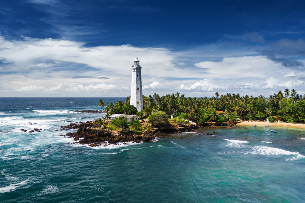 Lighthouse and beautiful beach landscape in Sri Lanka