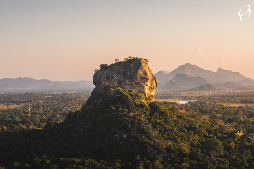 Sigiriya rock also known as Lion Rock at golden light of sunset. Beautiful landscape in Sri lanka.