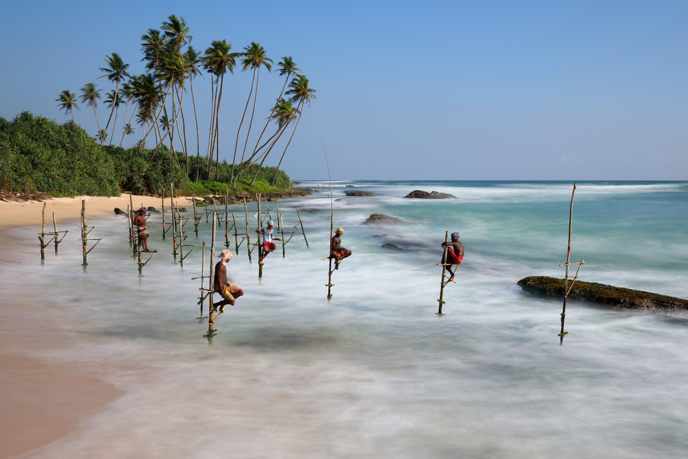 The,Stilt,Fishermen,Of,Sri,Lanka,At,The,Beach,Of